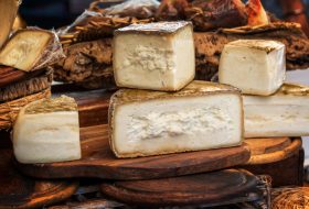 Italian pecorino cheese on a wooden rustic display