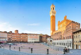 Panoramic view of famous Piazza del Campo in Siena at sunset, Tuscany, Italy